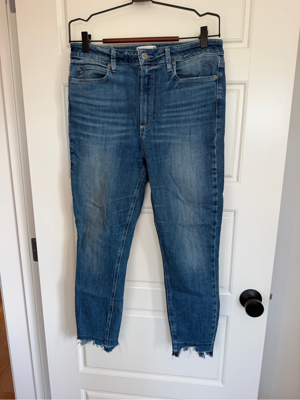 PAIGE Medium Blue Cropped Jeans with Distressed Hem